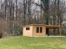 création d'une dalle de béton ainsi que le montage d'un chalet de jardin avec auvent 